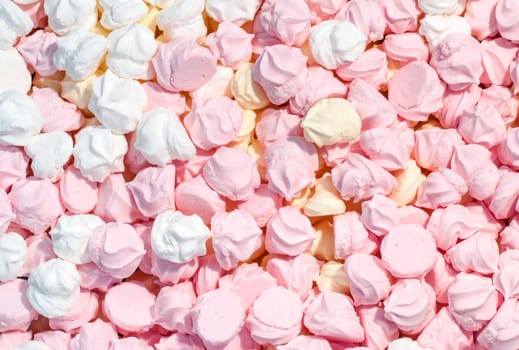 Background of pink white and yellow meringue