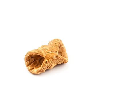 Empty sicilian cannolo pastry on white background