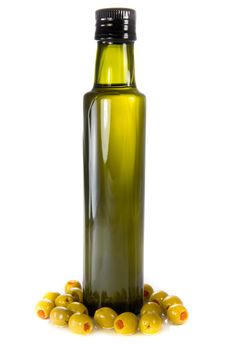 Picture of a bottle of olive oil with olives lying around