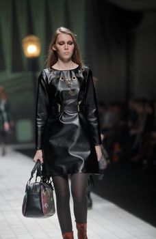 ZAGREB, CROATIA - MARCH 17: Fashion model wears clothes made by Hera by Robert Sever on "Dove FASHION.HR" show on March 17, 2012 in Zagreb, Croatia.
