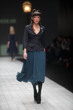 ZAGREB, CROATIA - MARCH 17: Fashion model wears clothes made by Ivica Skoko on "Dove FASHION.HR" show on March 17, 2012 in Zagreb, Croatia.