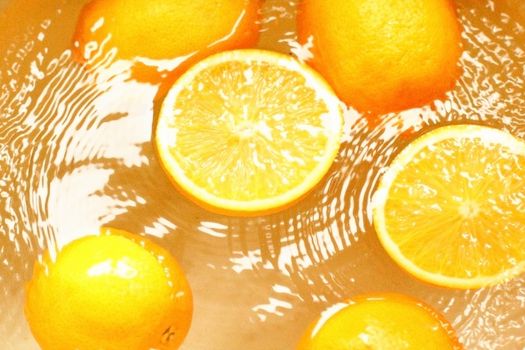 fresh fruit oranges, - swim in juice, water..