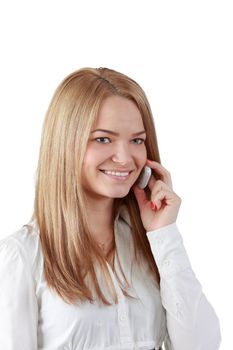 Portrait of a blonde young woman using a mobile phone isolated against  a white background.