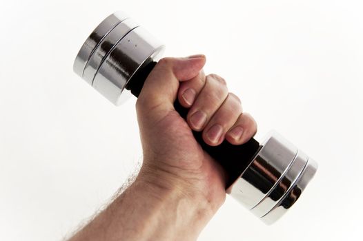 close up of a hand with weight