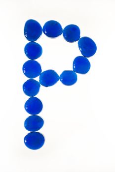 Close up of a glass nugget letter