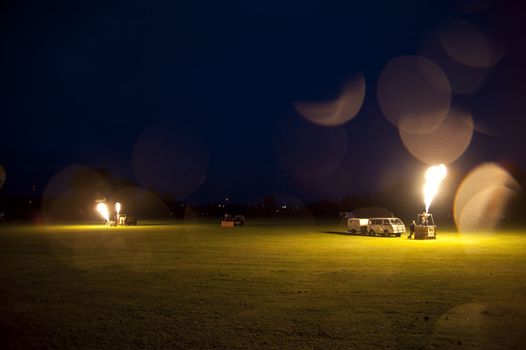 heater of hot air balloons by night