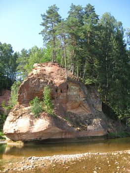 Zvārta Rock is one of the most spectacular outcrops of Devon rock formations in Latvia, set in the territory of the Gauja National Park. The Zvārta Rock has been formed by the River Amata gnawing at the sandstone on its banks.