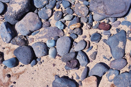 Sea beach. Natural small pebbles on the coast