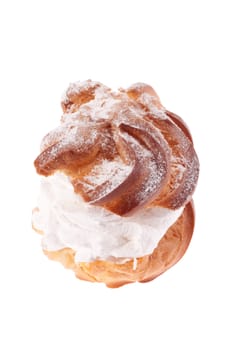 Cream puffs pastry with powdered sugar 