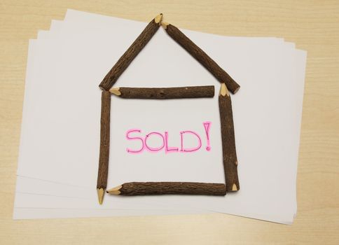 Home sold made with white papaer and natural wood pencil