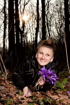 girl with snowdrops in the hands of