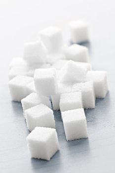 Close up of many white sugar cubes