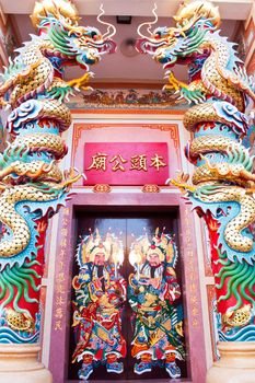 Traditional kind of house gates in China and Twin Dragon in Chinese temple