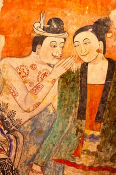 Ancient Buddhist temple mural depicting a Thai daily life scene at Wat Phumin, a famous temple in Nan province, Thailand. The temple is open to the public and has beautiful murals on the walls.