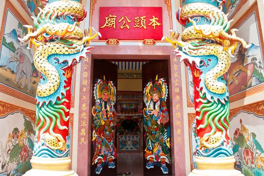 Traditional kind of house gates in China and Twin Dragon in Chinese temple