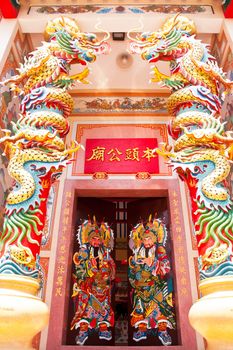 Traditional kind of house gates in China and Twin Dragon in Chinese temple