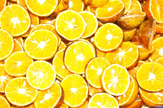 background made of sliced juicy oranges