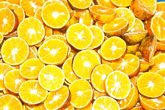 background made of sliced juicy oranges