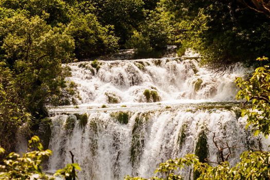 Cascade of waterfalls in the forest, Krka national park, Croatia