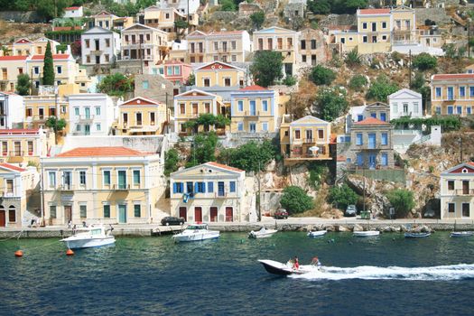 Greece. Dodecanesse. Island Symi (Simi). Colorful houses 
