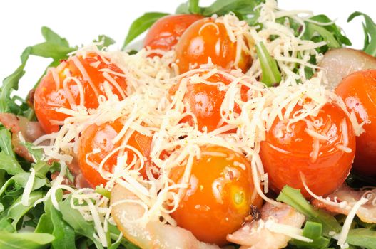 Salad with arugula and tomatoes. Isolated on white.