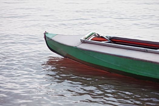 Canoe on still water of a lake
