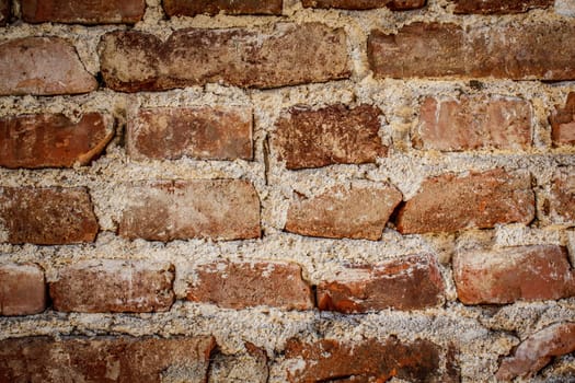 toned red brick wall grunge background or texture