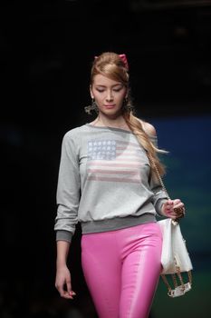 ZAGREB, CROATIA - MARCH 23: Fashion model wears clothes made by ELFS on "CRO A PORTER" show on March 23, 2012 in Zagreb, Croatia.