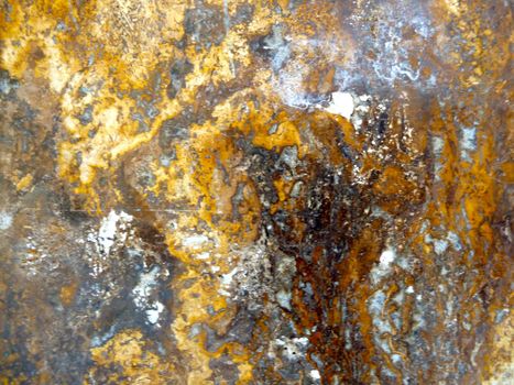 gold coloring on a stone surface