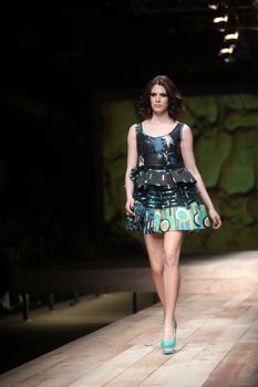 ZAGREB, CROATIA - MARCH 23: Fashion model wears clothes made by Monika Sablic on "CRO A PORTER" show on March 23, 2012 in Zagreb, Croatia.