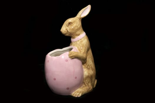 Ceramic Easter Bunny on a black background