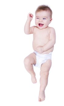 Little baby in diapers making gesture infron of a white background. Isolated.