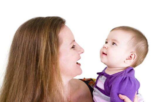 Mother looking at her stunned baby, perhaps distracted by angels.