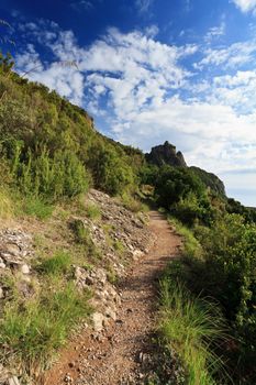 pathway between mountain and sea in Portofino natural park, Italy