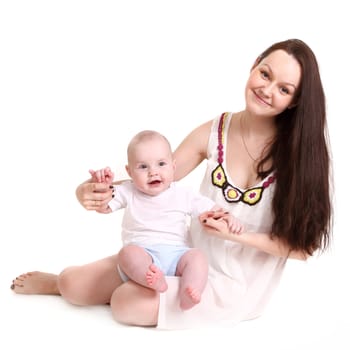 Young mum and the small son, portrait on a white background close up, the kid sits at mum in a lap and smiles. A format square