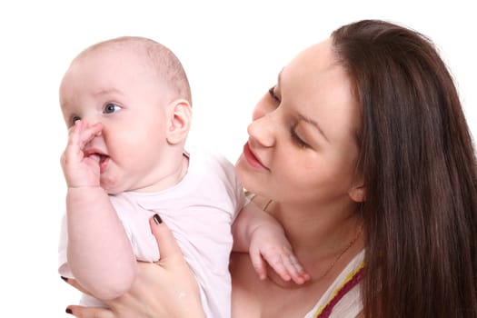 Young mum and the small son, portrait on a white background close up, the kid holds a finger in a mouth, a format horizontal.