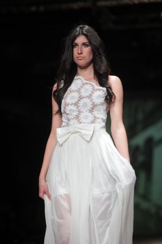 ZAGREB, CROATIA - MARCH 23: Fashion model wears clothes made by Monika Sablic on "CRO A PORTER" show on March 23, 2012 in Zagreb, Croatia.