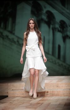 ZAGREB, CROATIA - MARCH 23: Fashion model wears clothes made by Monika Sablic on "CRO A PORTER" show on March 23, 2012 in Zagreb, Croatia.
