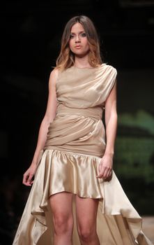 ZAGREB, CROATIA - MARCH 23: Fashion model wears clothes made by Monika Sablic on "CRO A PORTER" show on March 23, 2012 in Zagreb, Croatia.