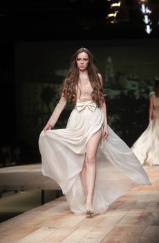 ZAGREB, CROATIA - MARCH 23: Fashion model wears clothes made by Monika Sablic on "CRO A PORTER" show on March 23, 2012 in Zagreb, Croatia.