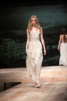 ZAGREB, CROATIA - MARCH 23: Fashion model wears clothes made by Monika Sablic on "CRO A PORTER" show on March 23, 2012 in Zagreb, Croatia.