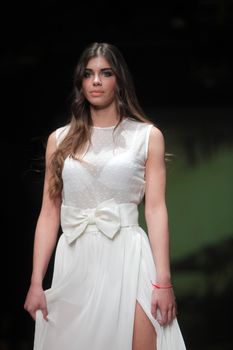 ZAGREB, CROATIA - MARCH 23: Fashion model wears clothes made by Monika Sablic on "CRO A PORTER" show on March 23, 2012 in Zagreb, Croatia.