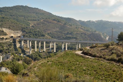 bridge between two mountains near the town of Nerja