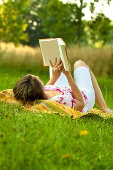 Beautiful woman relaxing in the park