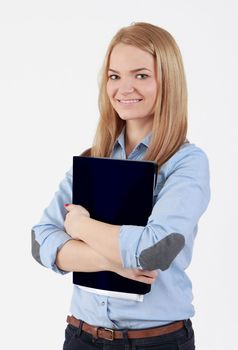 Portrait of a young blonde student girl holding a folder.