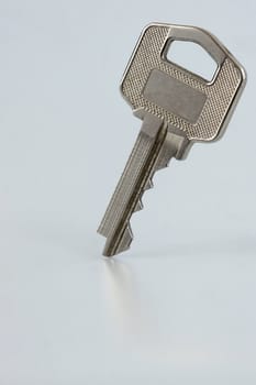 Closeup of a silver house key