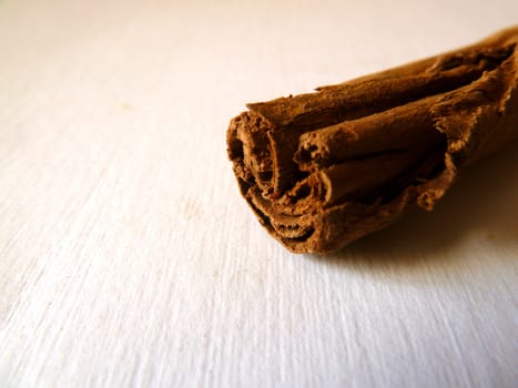 cinnamon bark on a white textured background