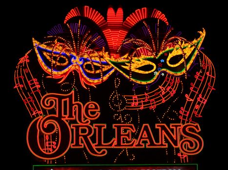 Las Vegas, USA - November 30, 2011: The lights of The Orleans Hotel and Casino Sign showcase the Mardi Gras theme of the property.  The Orleans was opened in Las Vegas, Nevada in the year 1996.