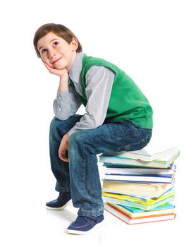 Education - funny boy with books. Isolated over white background.