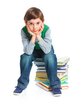Education - funny boy with books. Isolated over white background.
